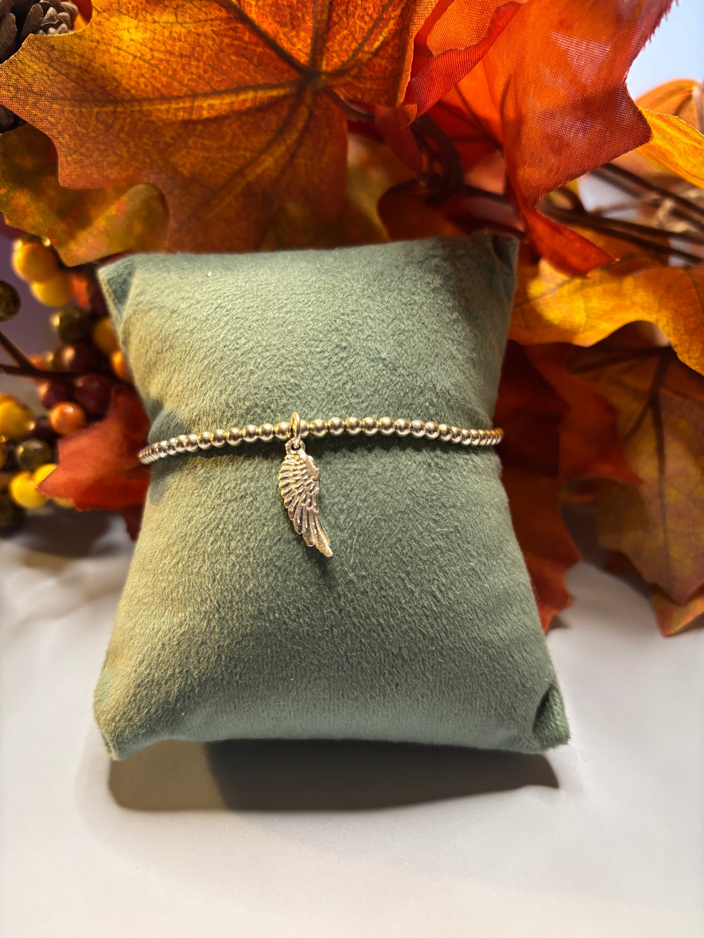 Sterling Silver Beaded bracelet with a large Angel Wing