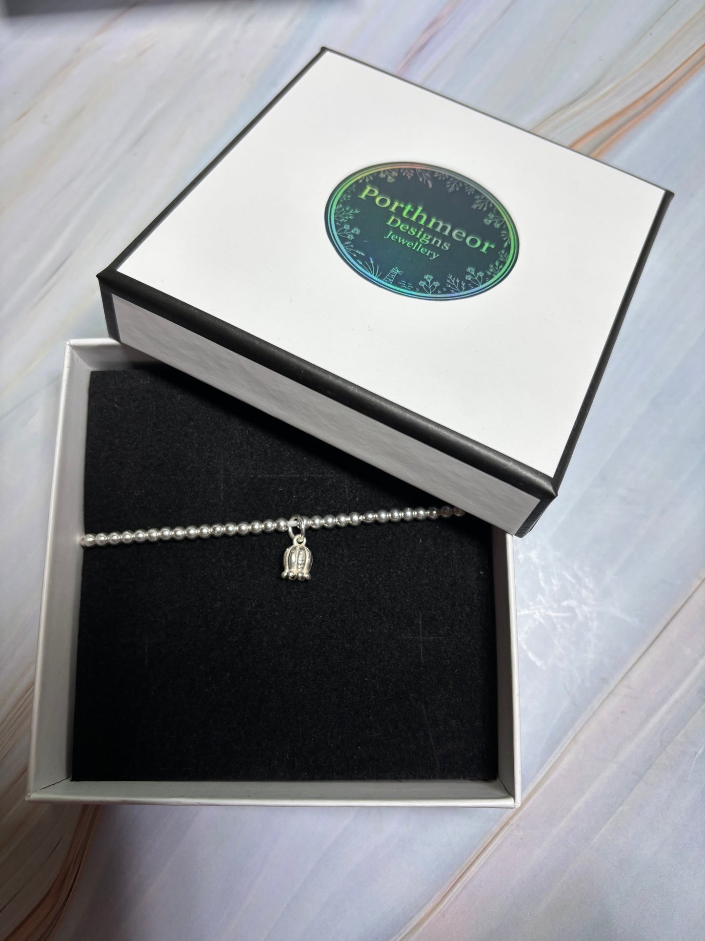 Sterling Silver Beaded bracelet with a star charm