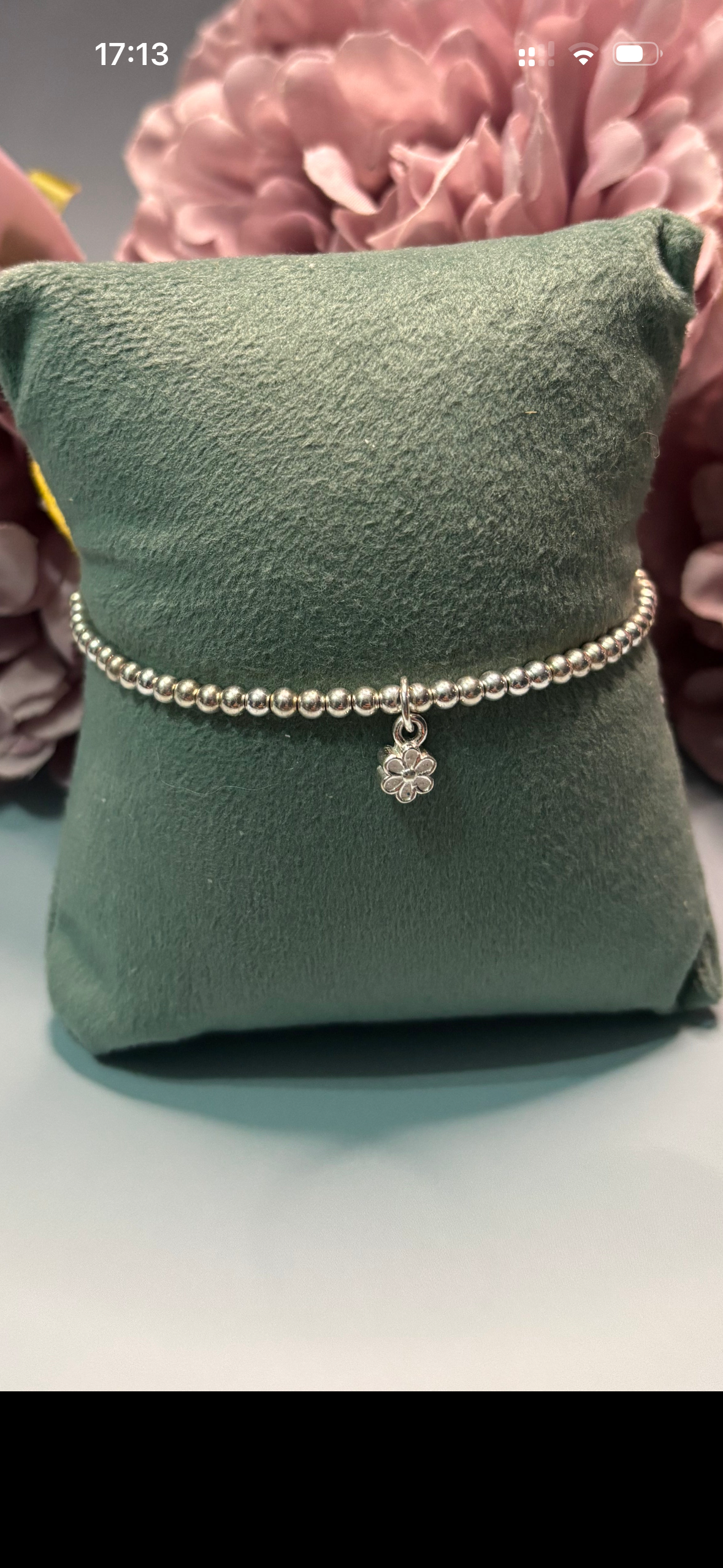 Sterling Silver Beaded bracelet with a delicate flower charm