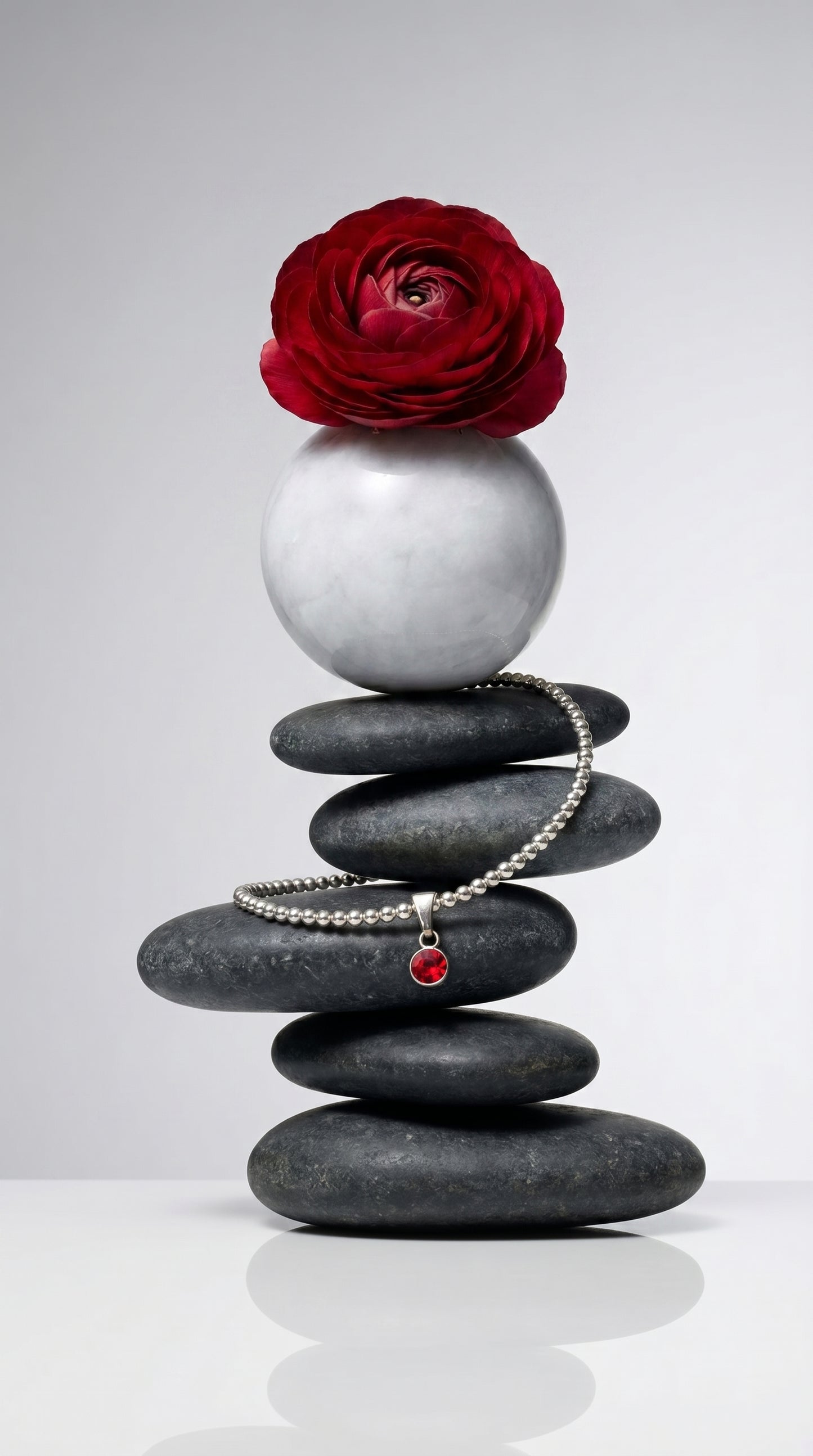 Sterling Silver Beaded bracelet with a 6mm garnet birthstone charm