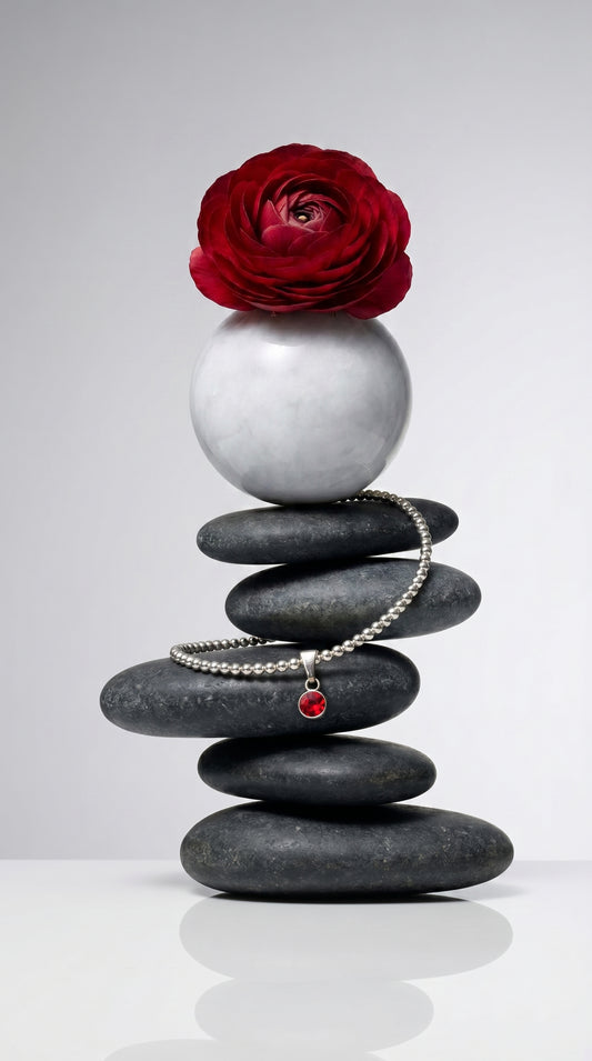 Sterling Silver Beaded bracelet with a 6mm garnet birthstone charm