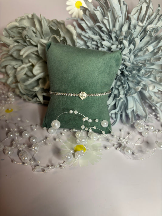 Sterling silver beaded bracelet with flower bead charm