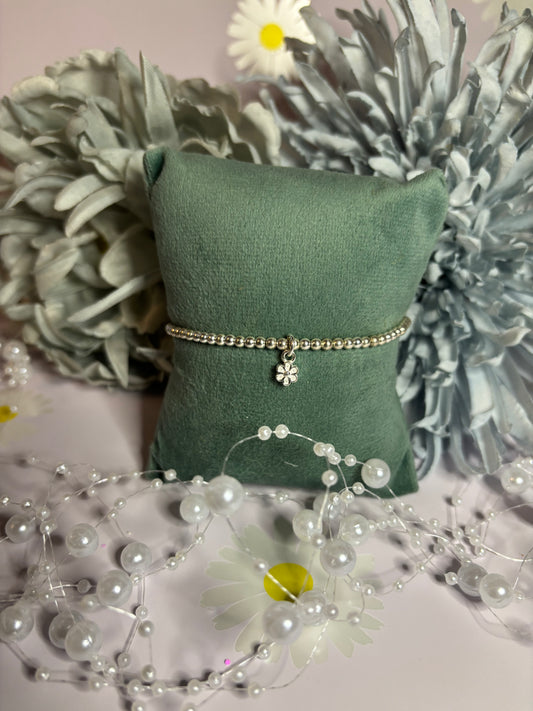 Sterling Silver Beaded bracelet with a 5 petal flower charm