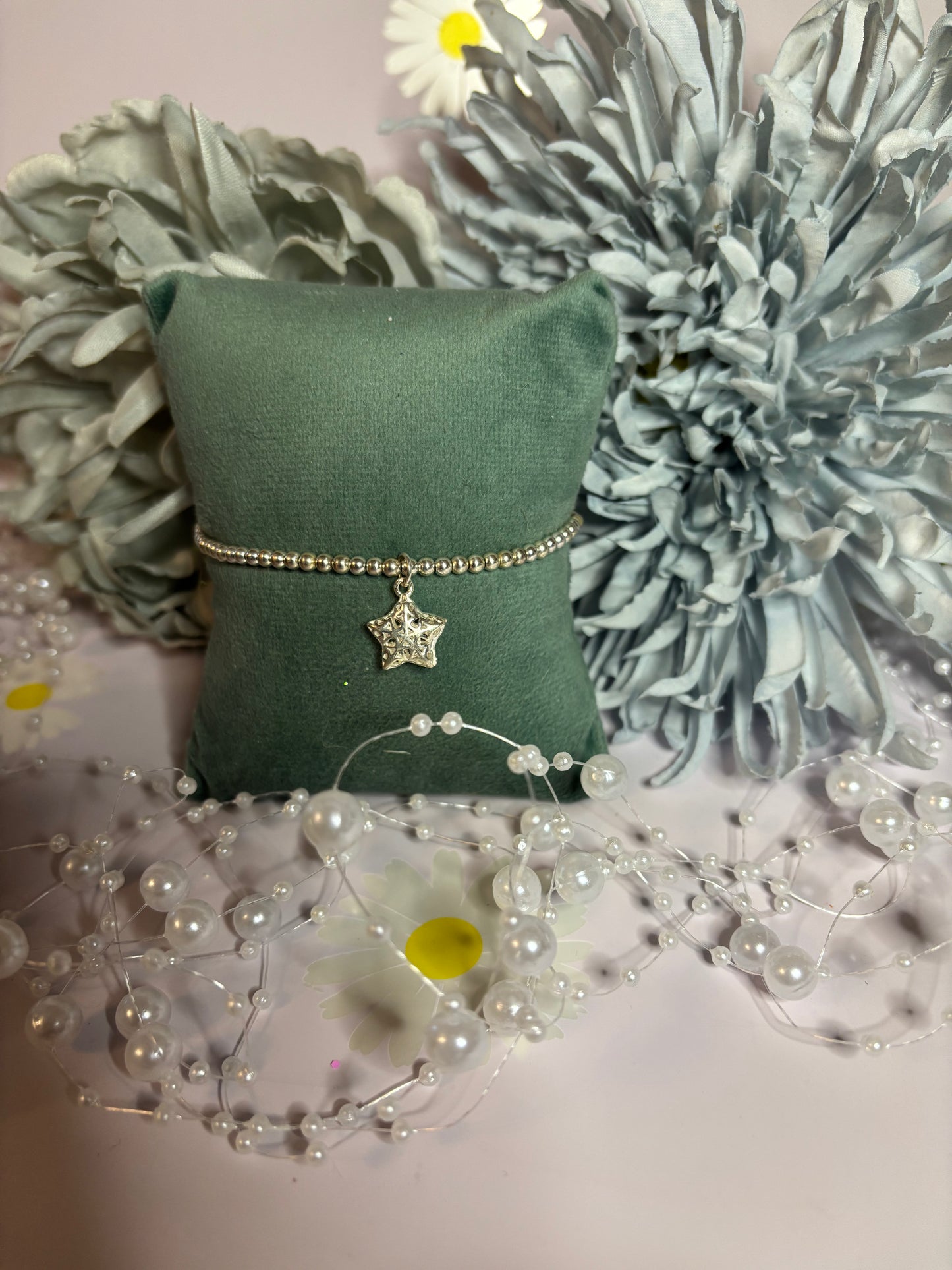 Sterling Silver Beaded bracelet with a star charm