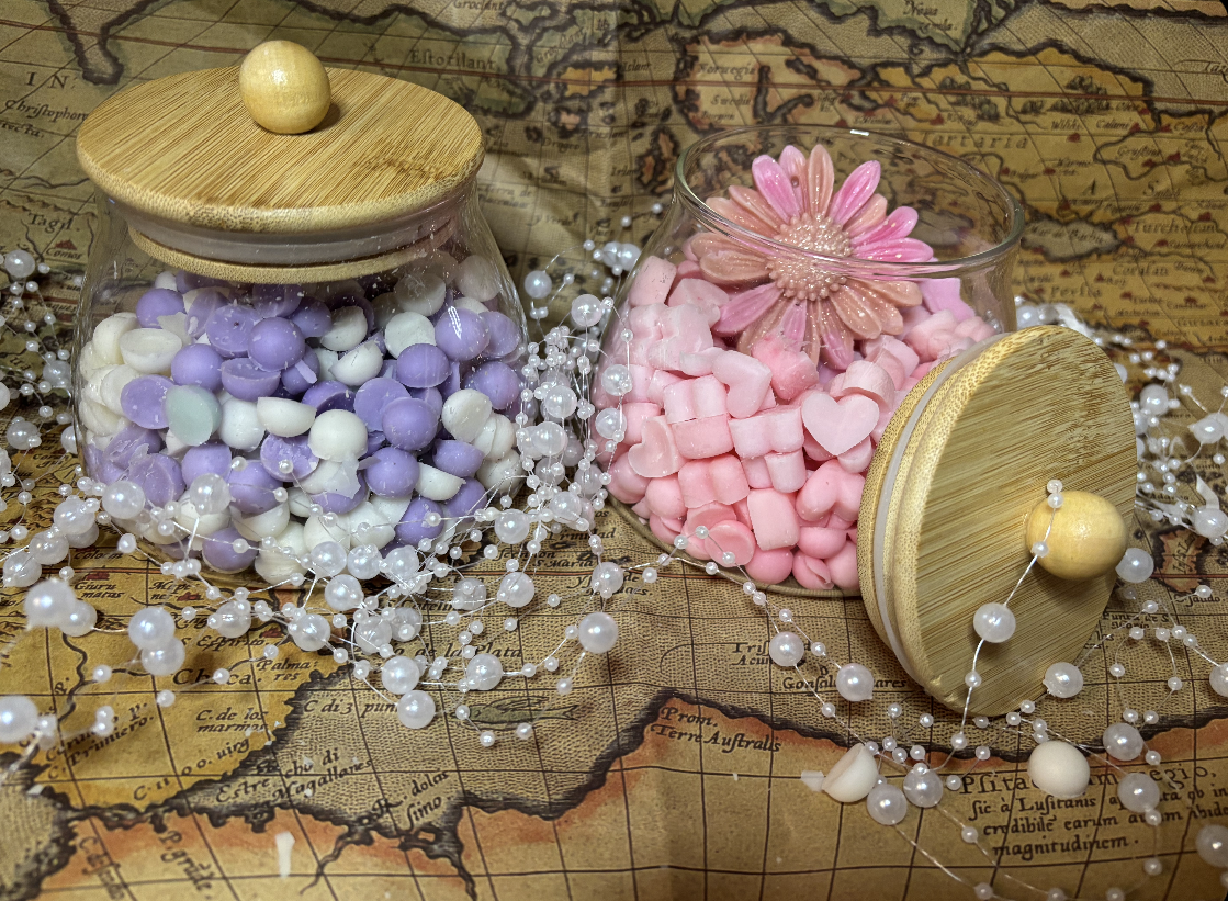 Large glass jar full of scented scoopies