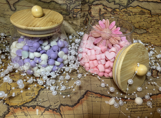 Large glass jar full of scented scoopies