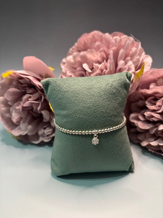 Sterling Silver Beaded bracelet with a delicate flower charm