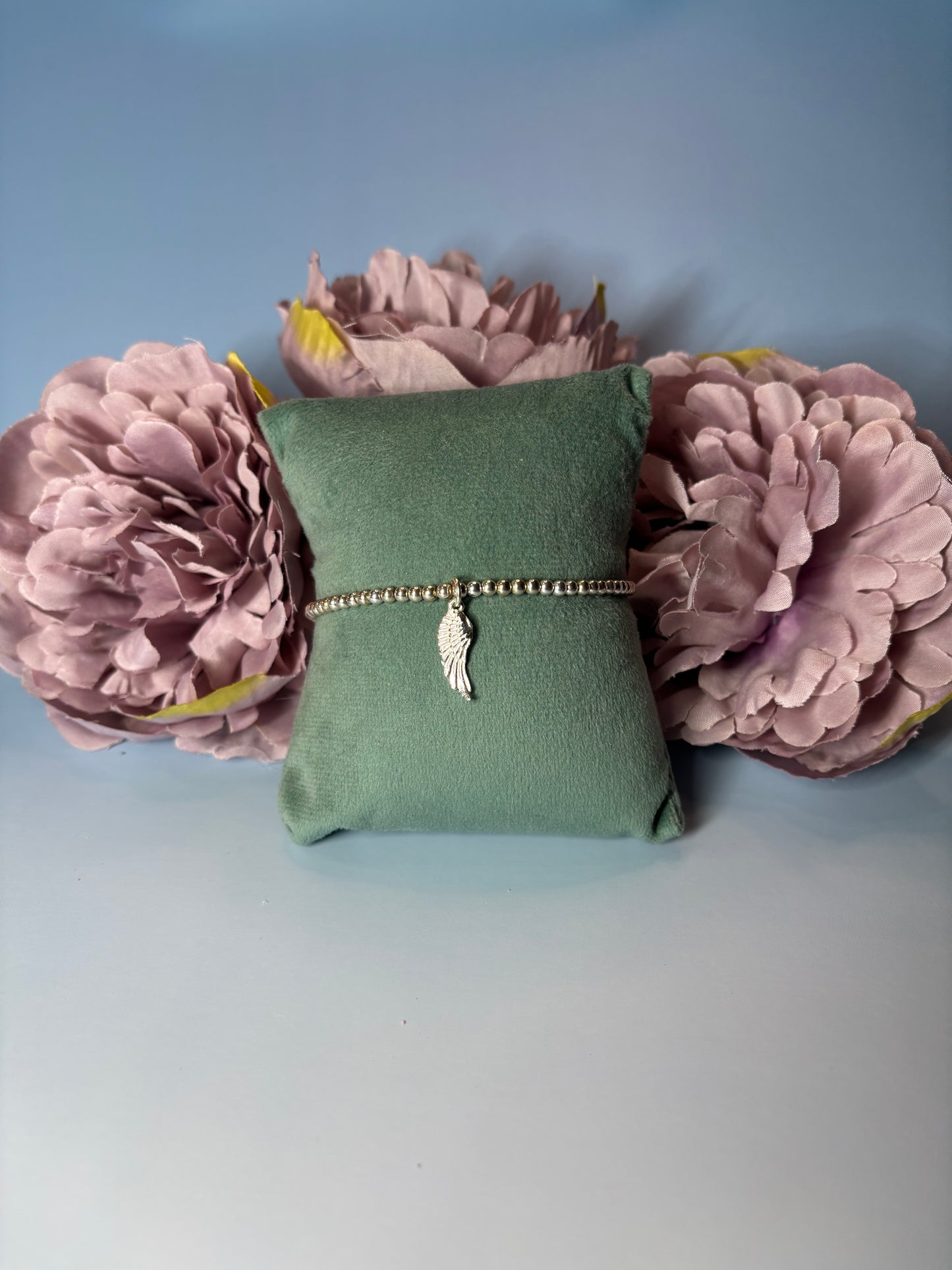 Sterling Silver Beaded bracelet with a large Angel Wing