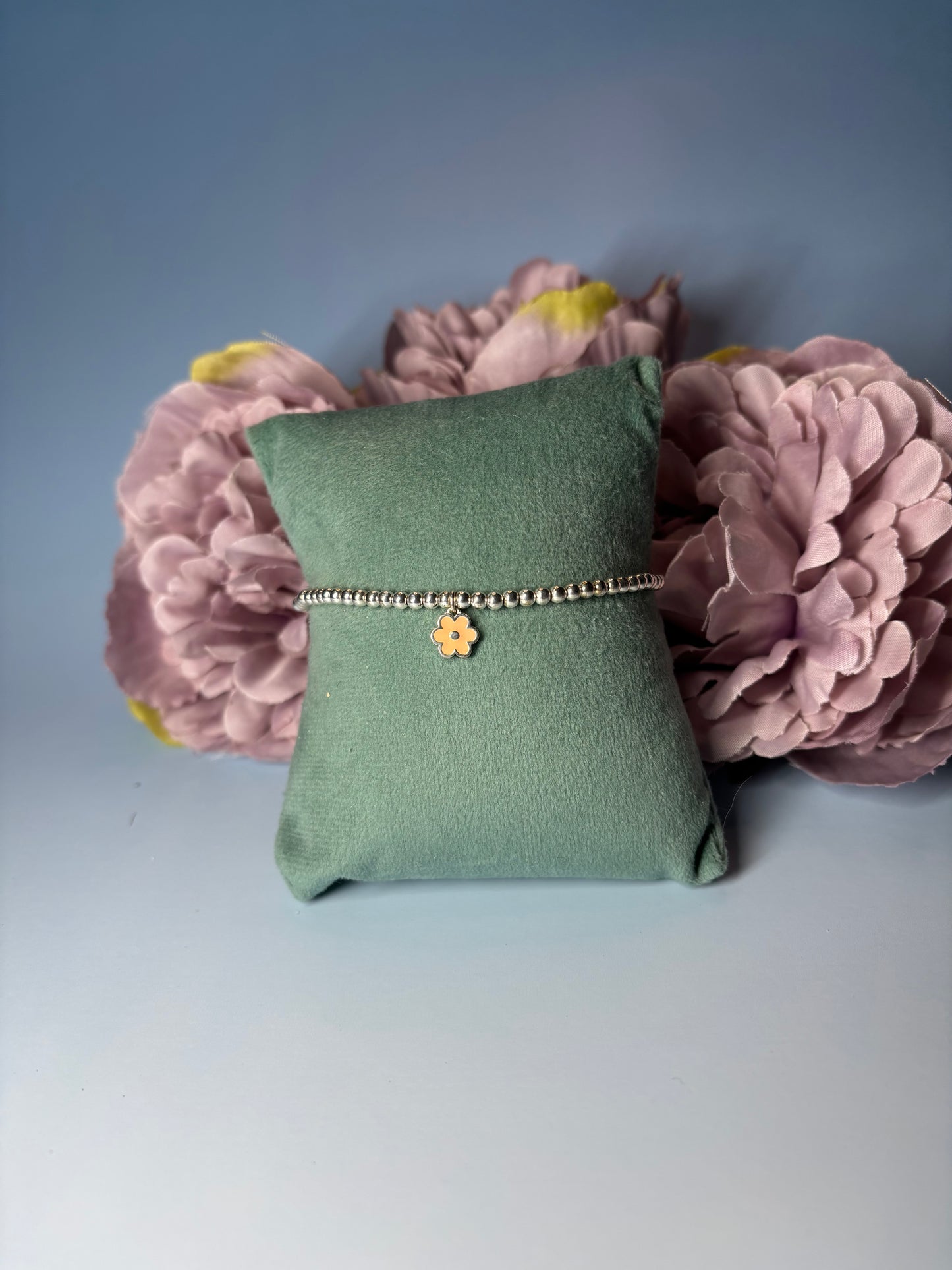 Sterling Silver Beaded bracelet with a pink or blue flower