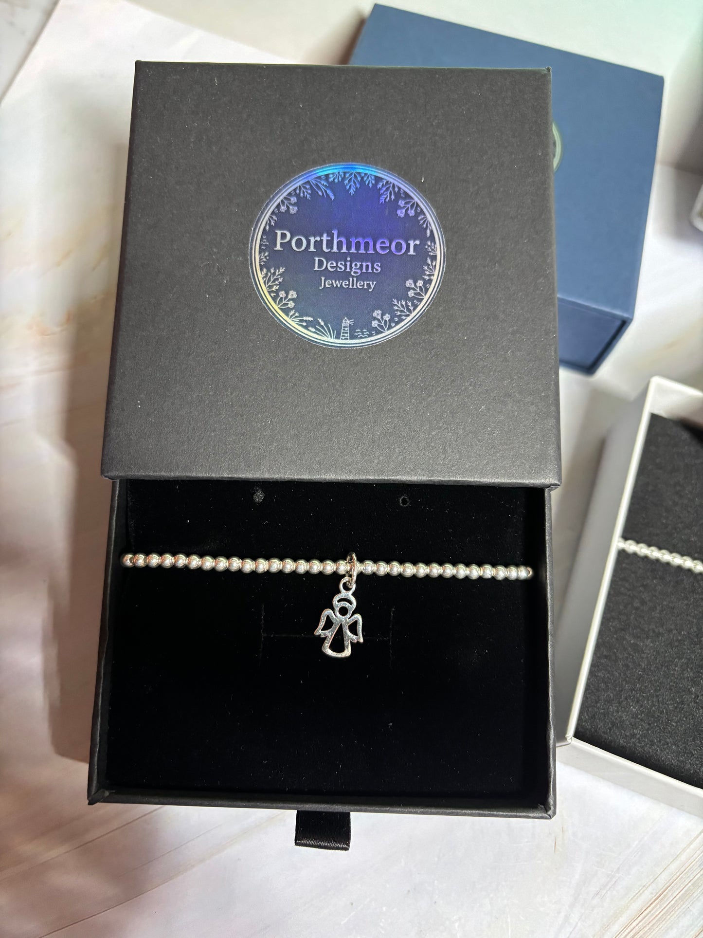 Sterling Silver Beaded bracelet with a star charm