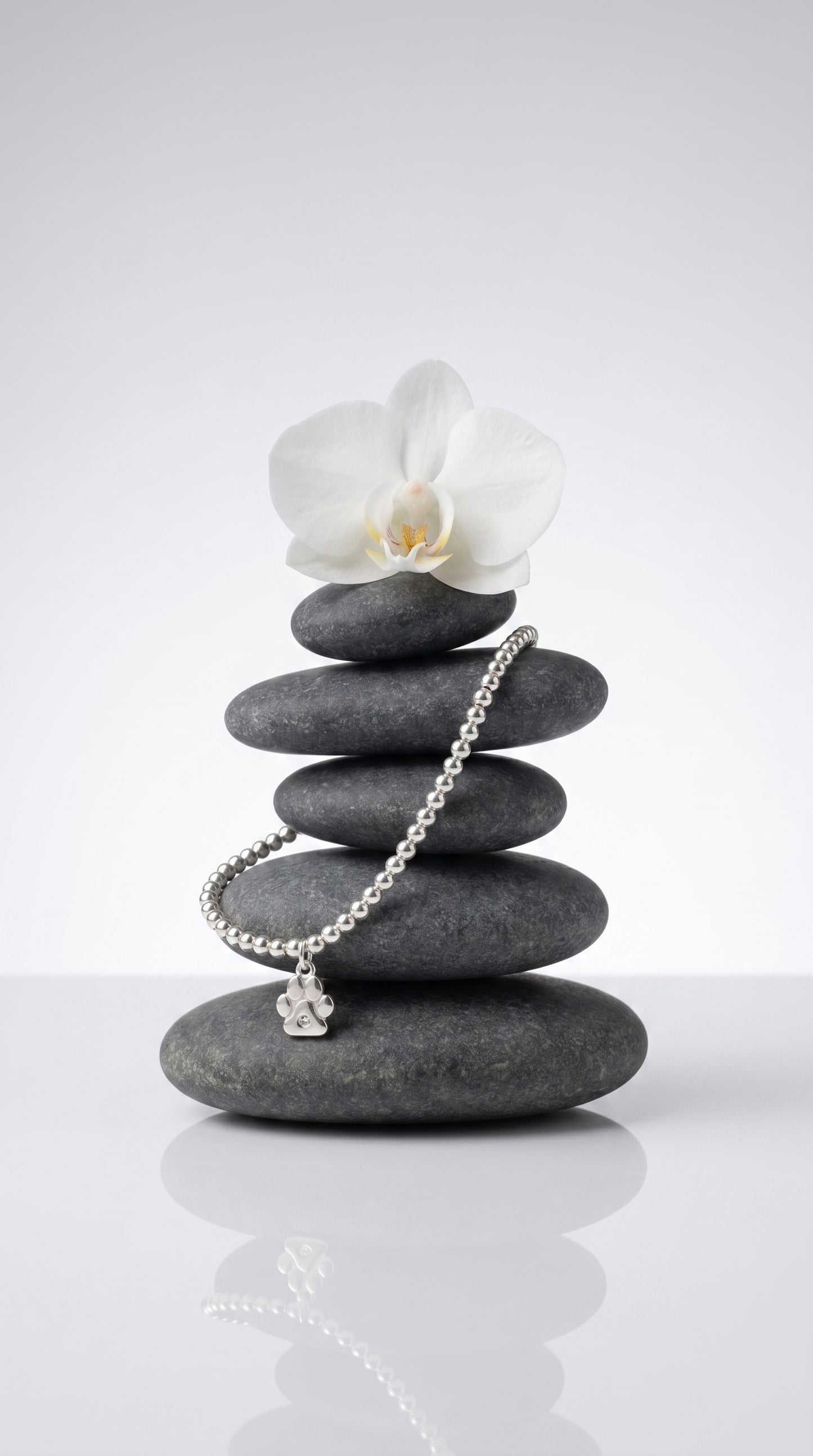 Sterling Silver Beaded bracelet with a paw print charm