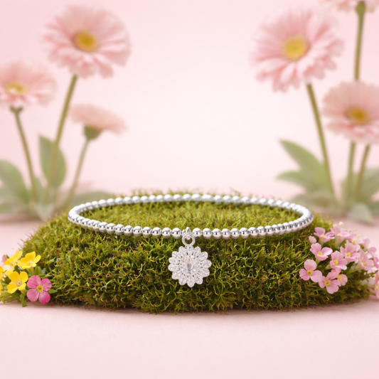 Sterling Silver Beaded bracelet with a pretty sunflower charm