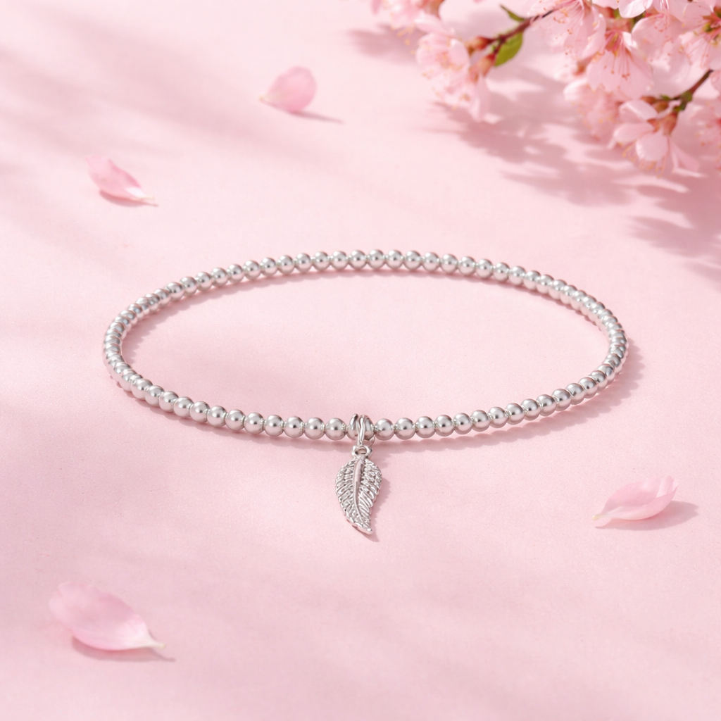 Sterling Silver Beaded bracelet with an Angel Wing charm