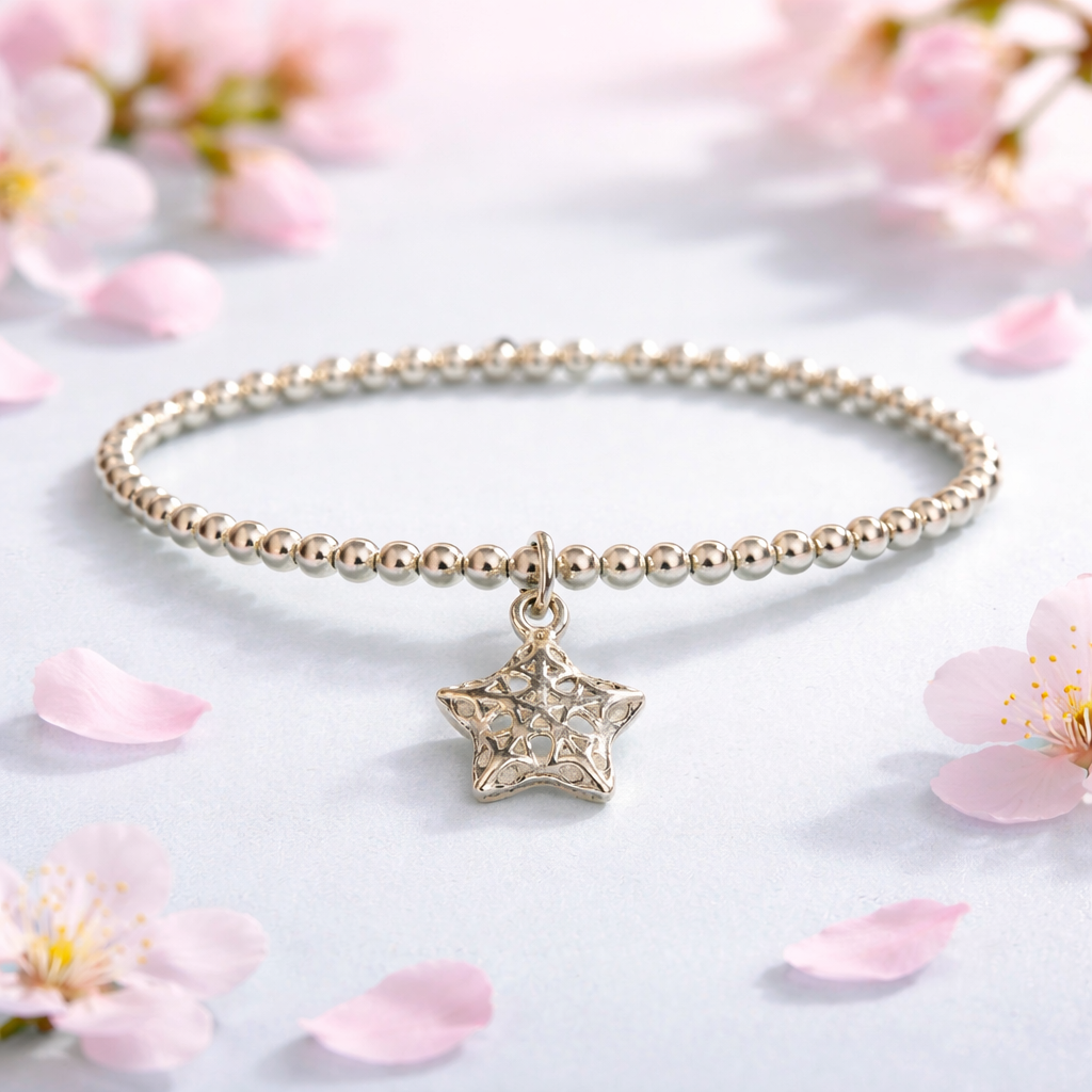 Sterling Silver Beaded bracelet with a star charm