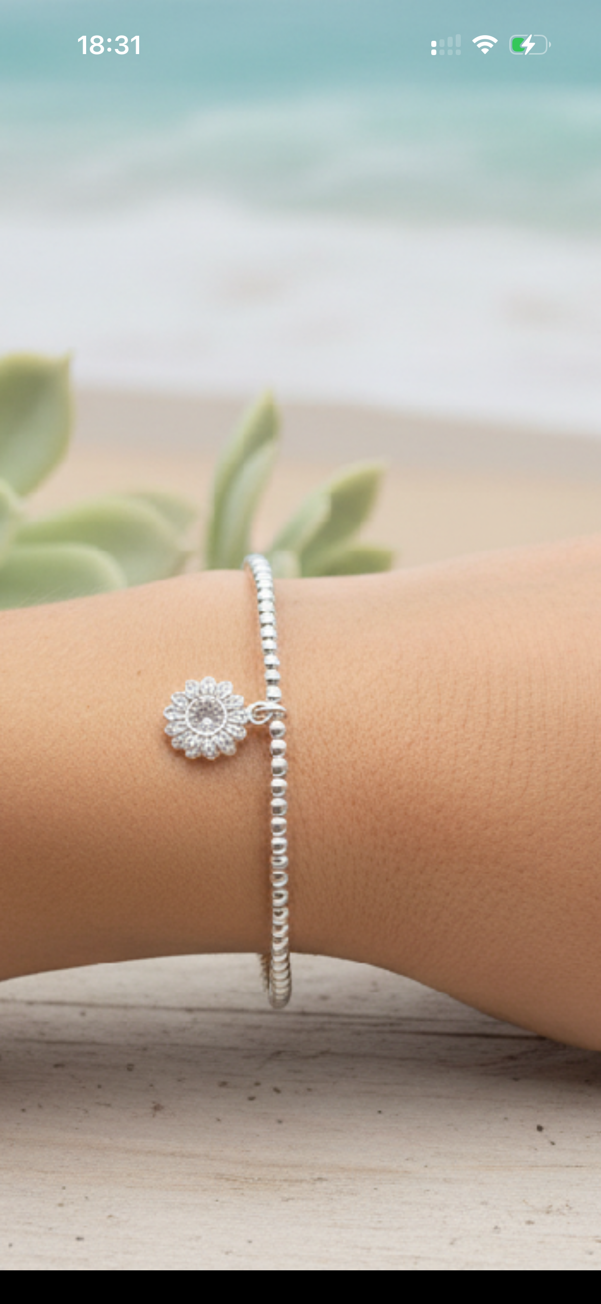 Sterling Silver Beaded bracelet with a pretty sunflower charm