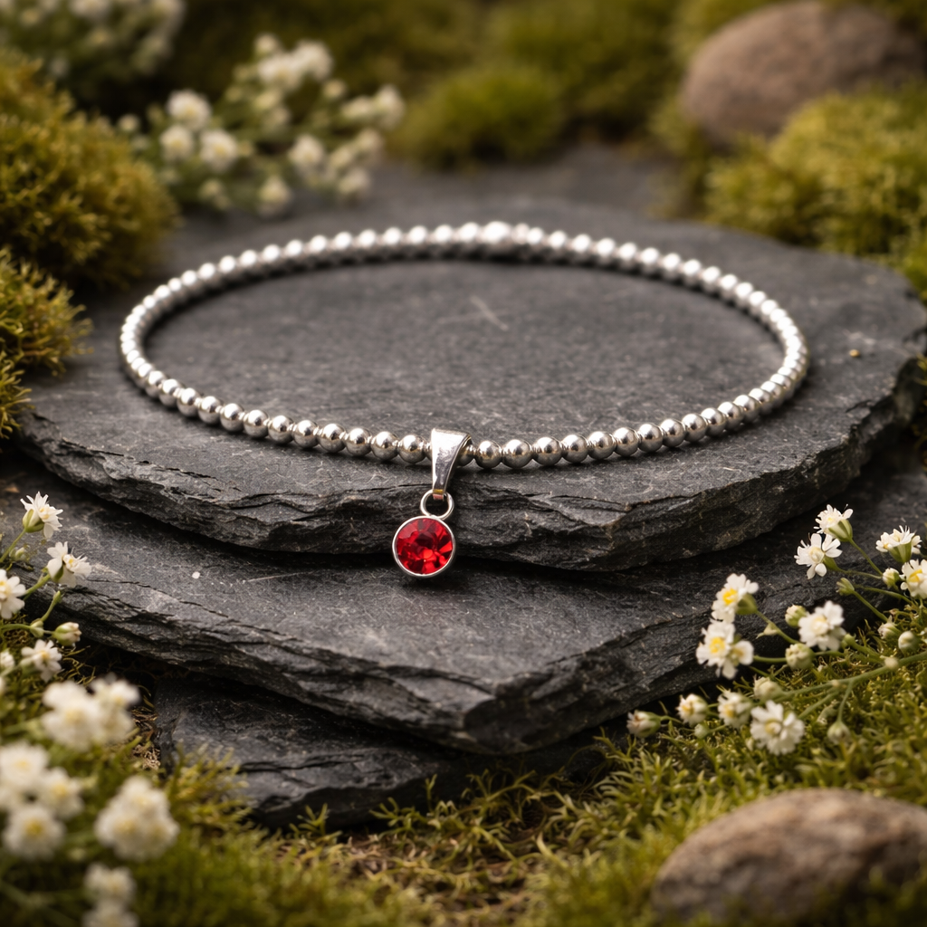 Sterling Silver Beaded bracelet with a 6mm garnet birthstone charm