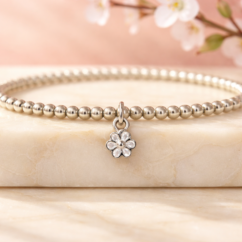 Sterling Silver Beaded bracelet with a flower charm