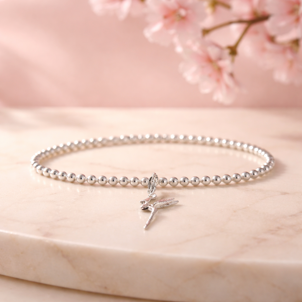 Sterling Silver Beaded bracelet with a Tinker bell charm