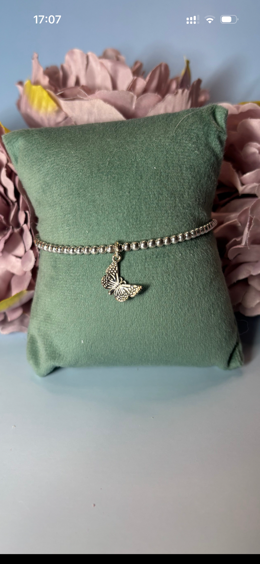 Sterling Silver Beaded bracelet with a large butterfly charm