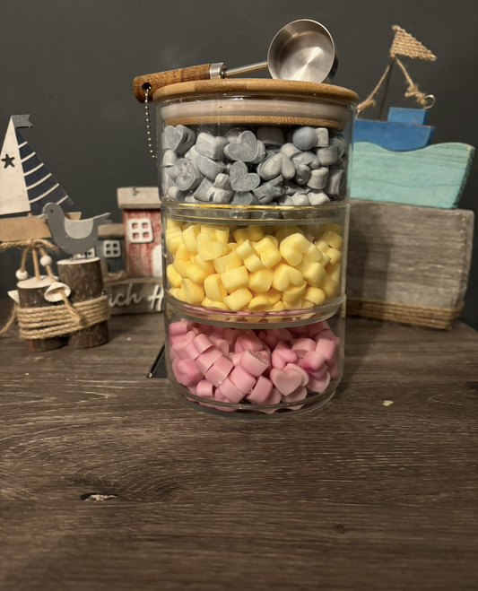 3 tier Glass storage jars filled with wax scoopies